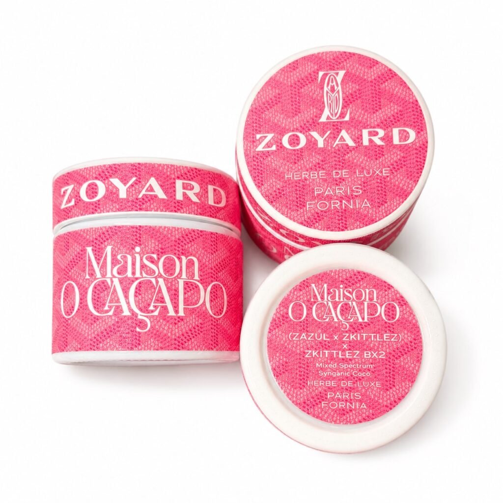 Trio of Zoyard Pink Herbe de Luxe jars by Maison O Caçapo featuring pink chevron pattern and premium Paris‑Fornia branding.